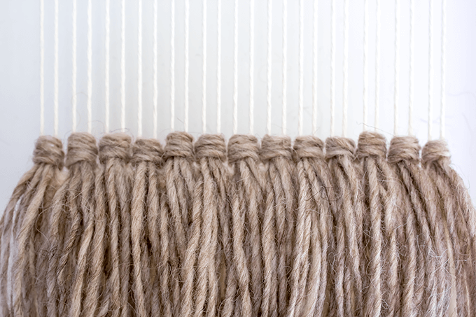 Second row of fringe | weaving DIY
