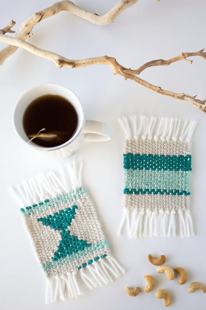 Make some super cute woven coasters using cardboard, yarn and needle. So simple and beautiful to create. A great project for beginner weavers!