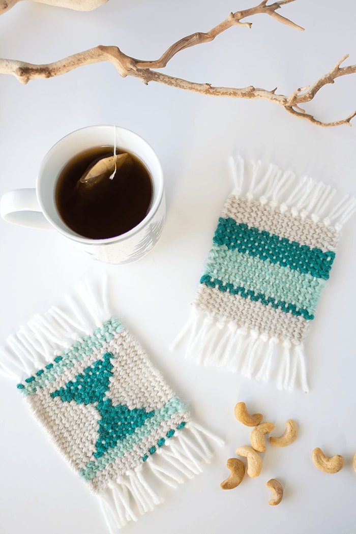 Make some super cute woven coasters using cardboard, yarn and needle. So simple and beautiful to create. A great project for beginner weavers!
